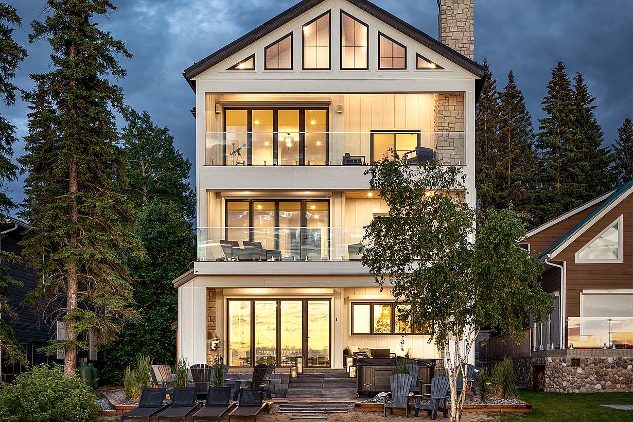lakefront home design with NanaWall glass walls