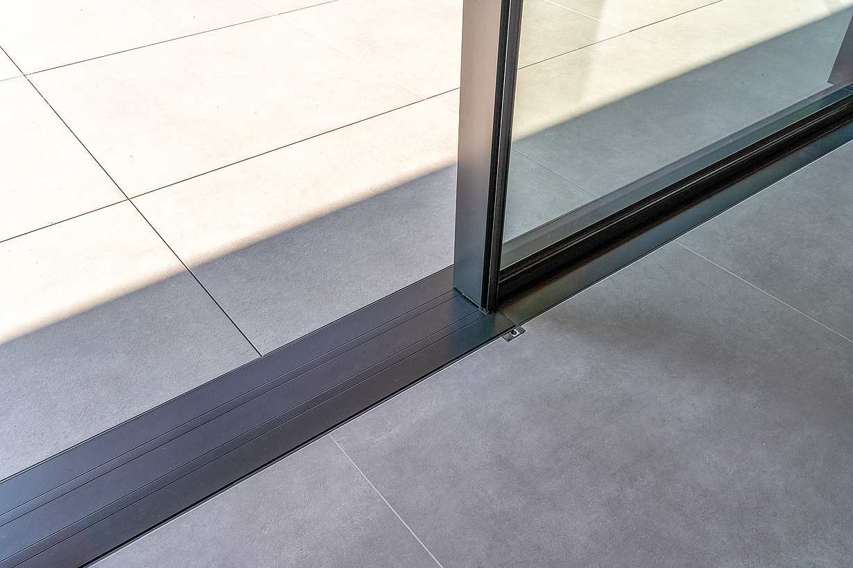 performance sill for sliding glass door system