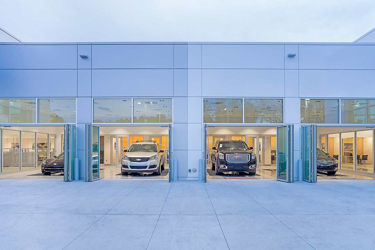 commercial glass doors in auto dealership design