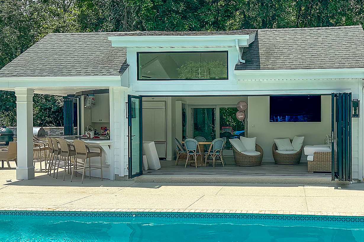 pool house designe with folding and sliding opening glass doors