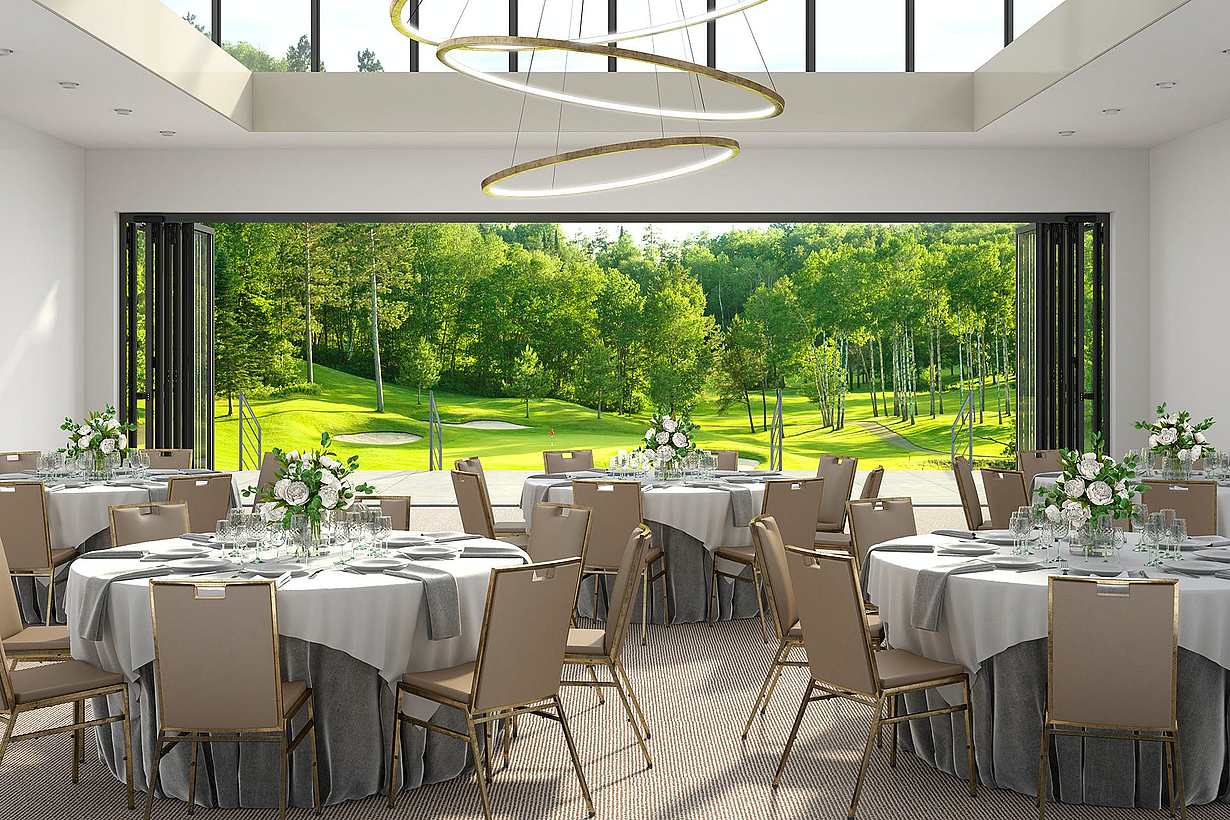 A banquet room with a view of a golf course, featuring commercial glass walls - doors stacked on both sides