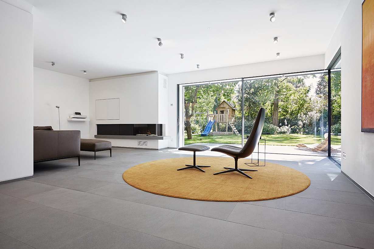 Sliding patio doors in modern home design enhance indoor-outdoor living with expansive glass panels and minimal framing
