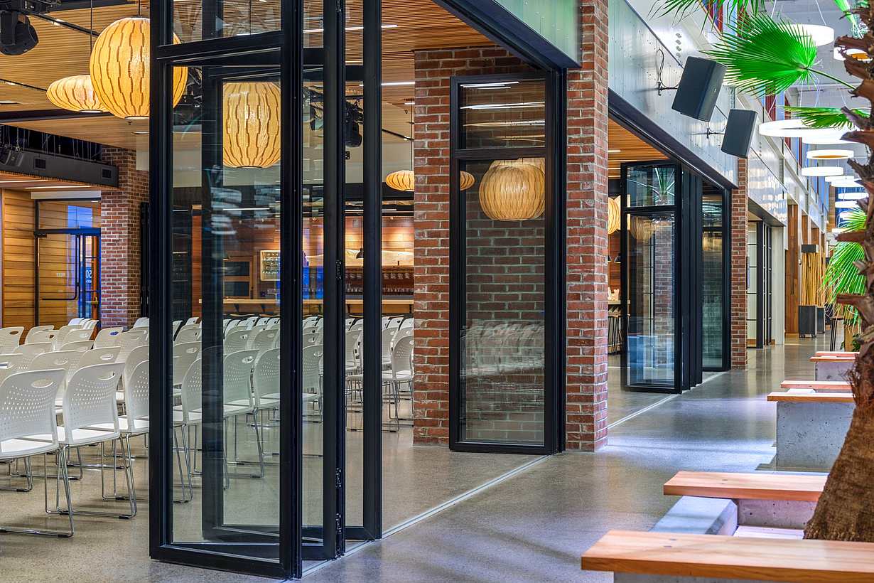 Coworking campus with interior folding glass walls 
