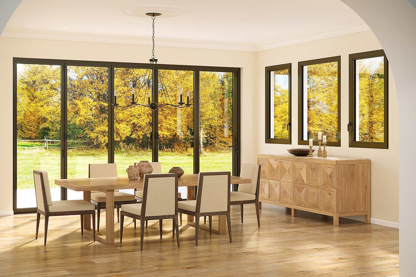 Dining room features large thermal-efficiency tilt-turn windows showcase the vibrant autumn trees outside. 