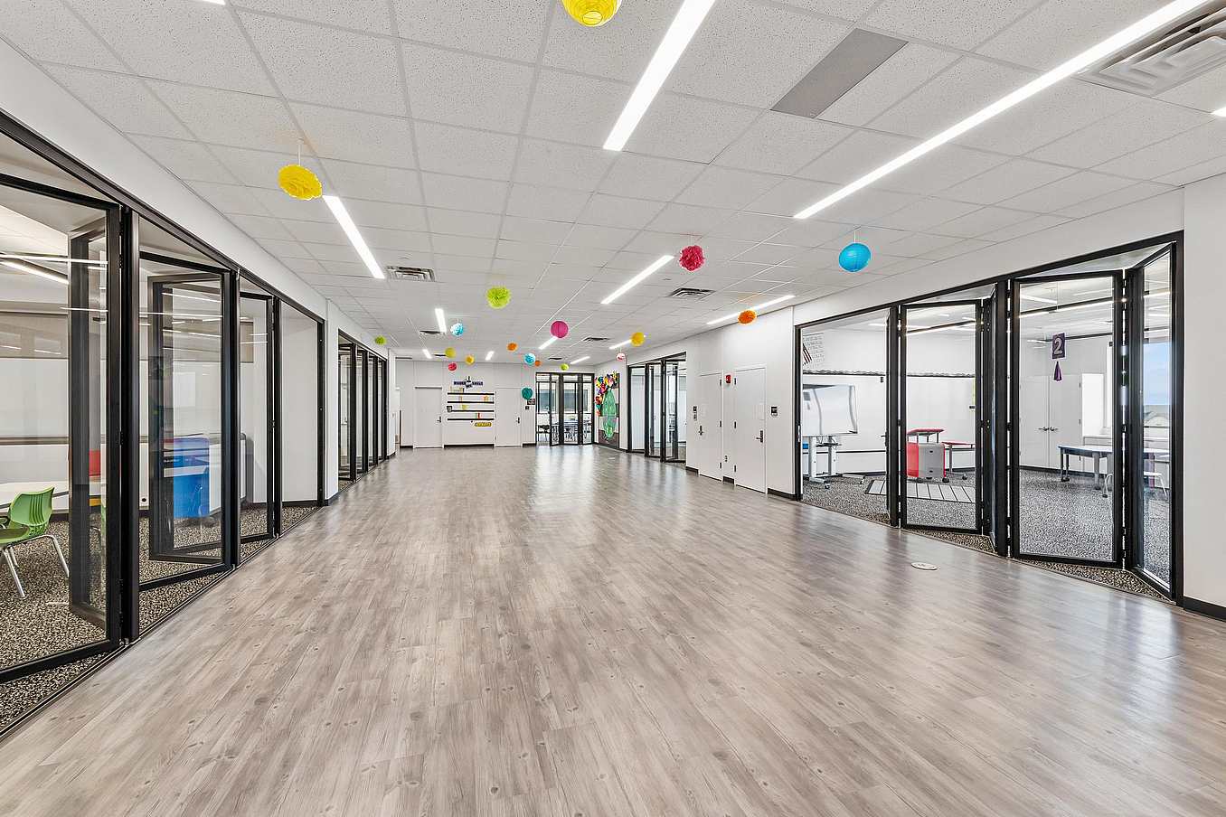 Classroom hallway with folding glass doors 