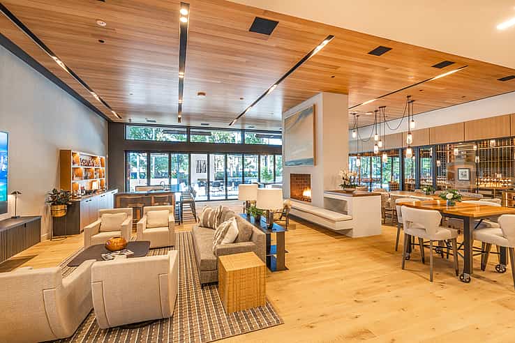 Goldenberg residence in Wilmington NC featuring NanaWall HSW60 top-hung sliding glass wall creating seamless indoor-outdoor connection