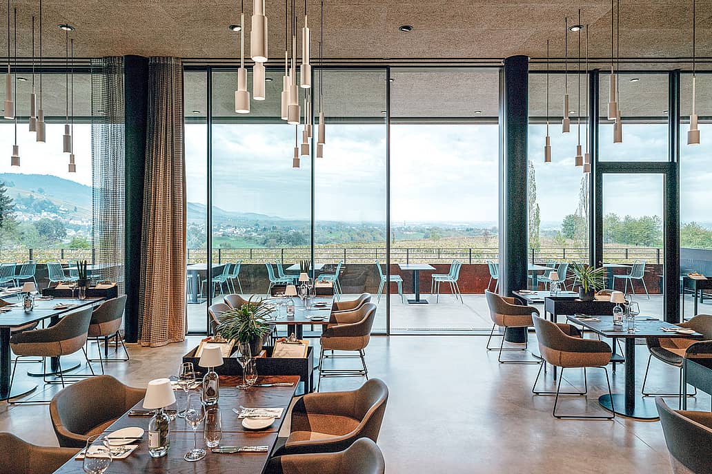 NanaWall minimal sliding glass wall system at a winery project, combining large glass panels with precision engineering and verified system performance