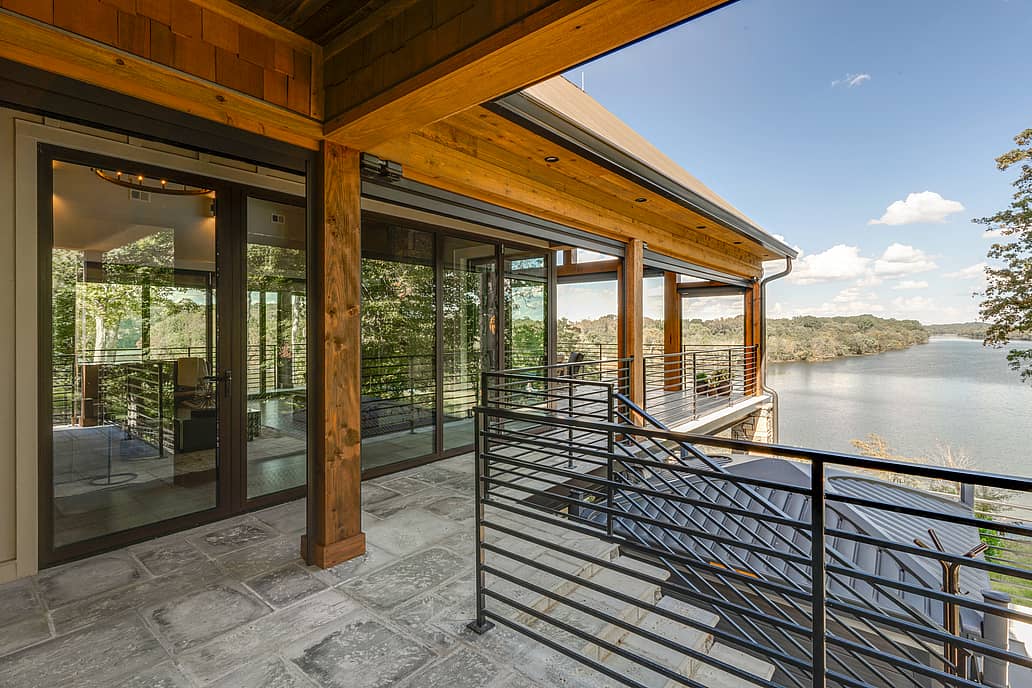 Rustic river lodge in Lebanon TN with NanaWall NW Aluminum 840 folding glass wall open to mountain views