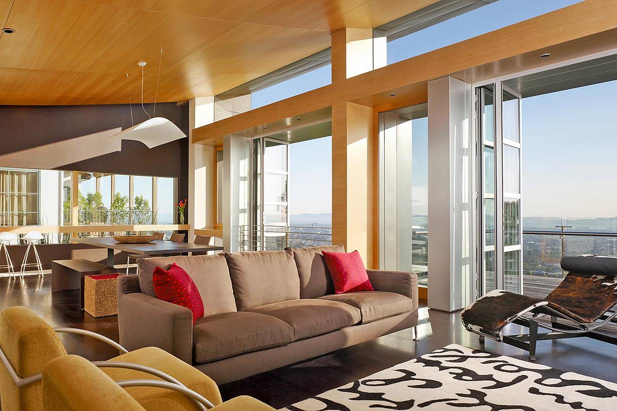 hillside modern home design inspiration with view through folding glass door
