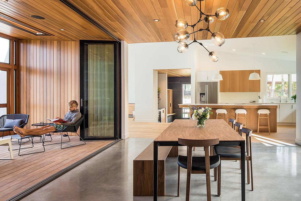 serene design inspiration in open concept living with folding glass wall