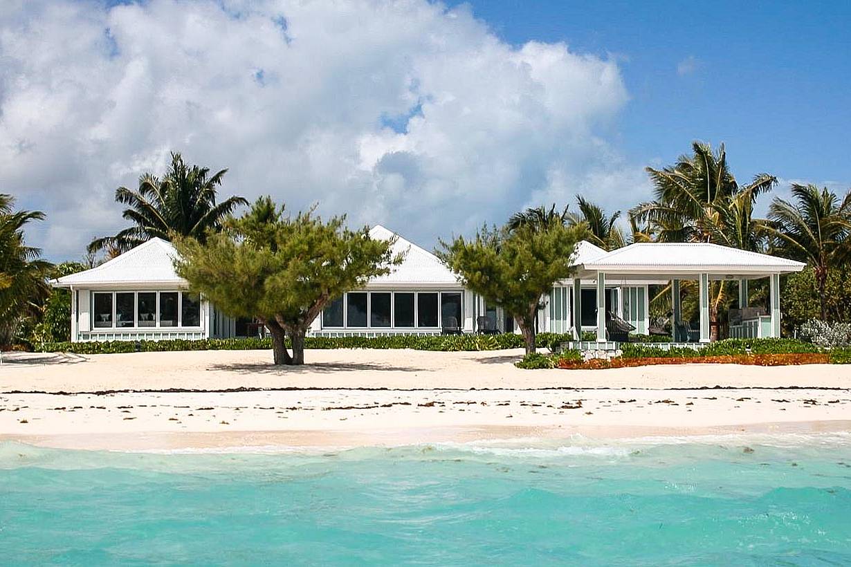 vacation home with folding glass windows with windload resistance for hurricane season