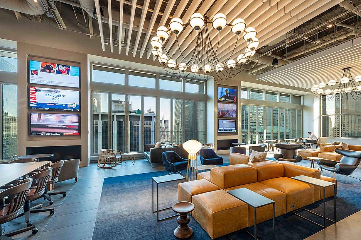 amenities floor with large opening glass walls looking out to city view