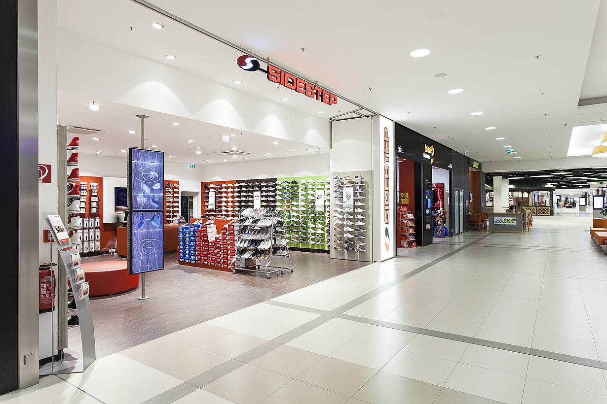 commercial design with disappearing retail storefront in a mall
