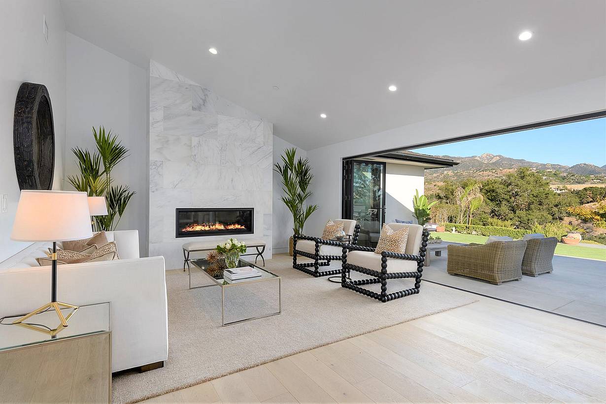 California ranchstyle home remodeled with folding glass walls in living room