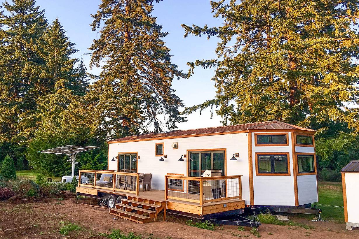 tiny home in Hawaii with two folding glass walls that open to deck