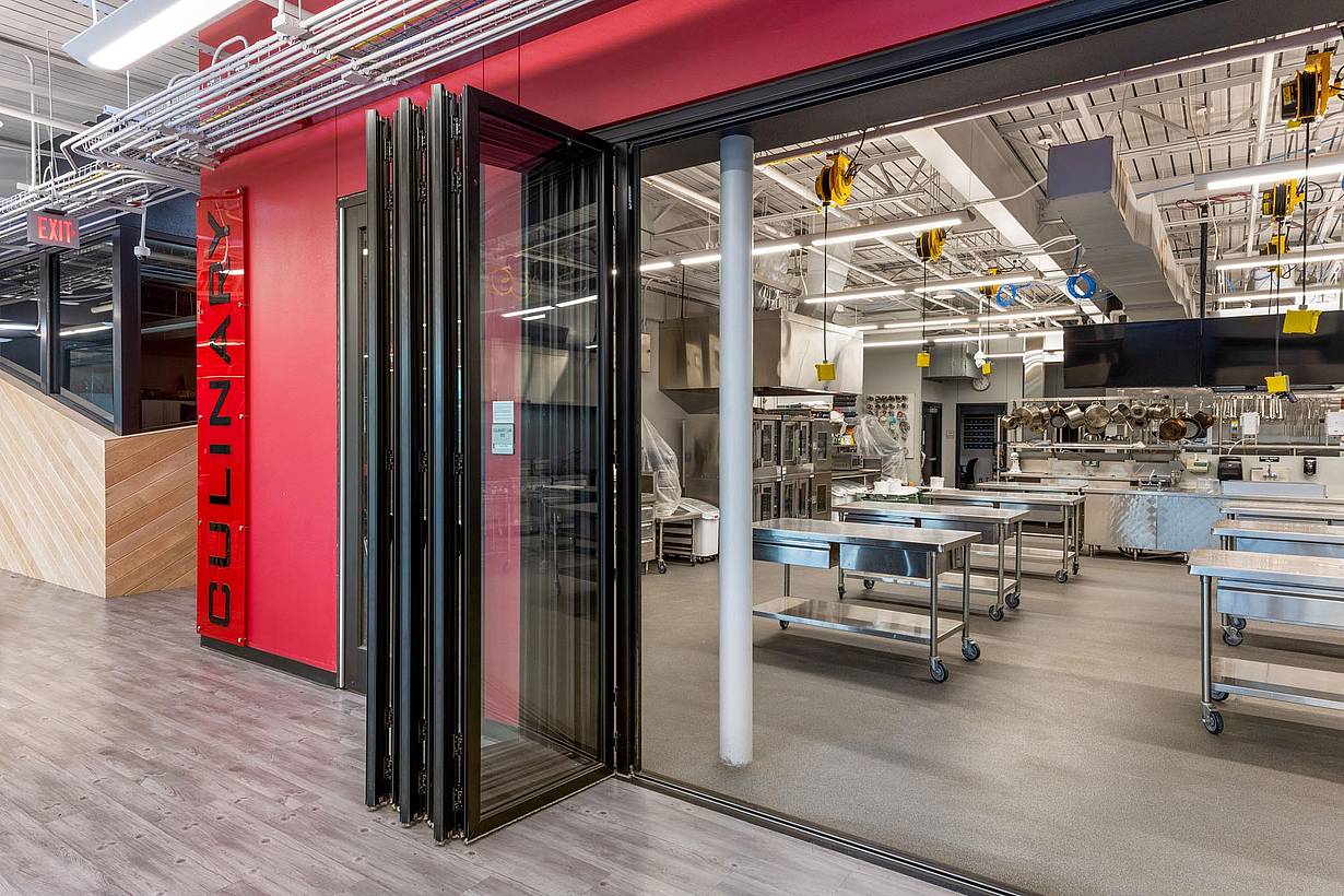 close up of folding glass doors in high school career center for culinary arts