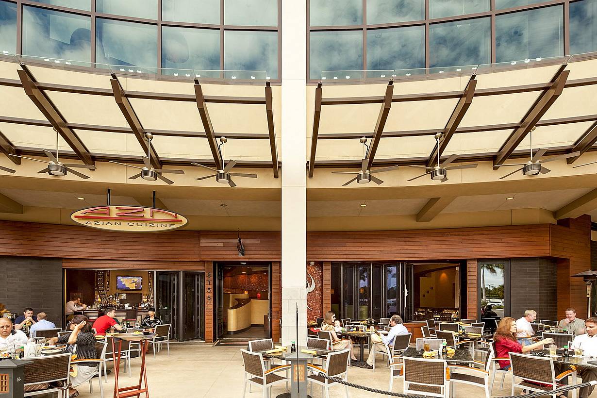 open restaurant design facilitates outdoor dining with moving glass walls