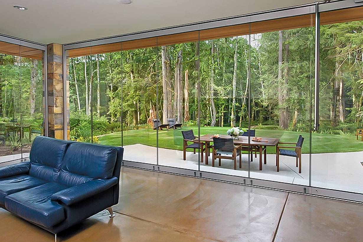sunroom with frameless exterior glass walls ClimaClear