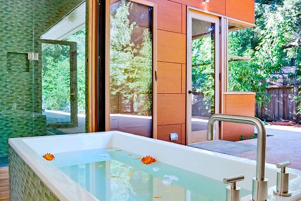 retractable glass doors in bathroom design