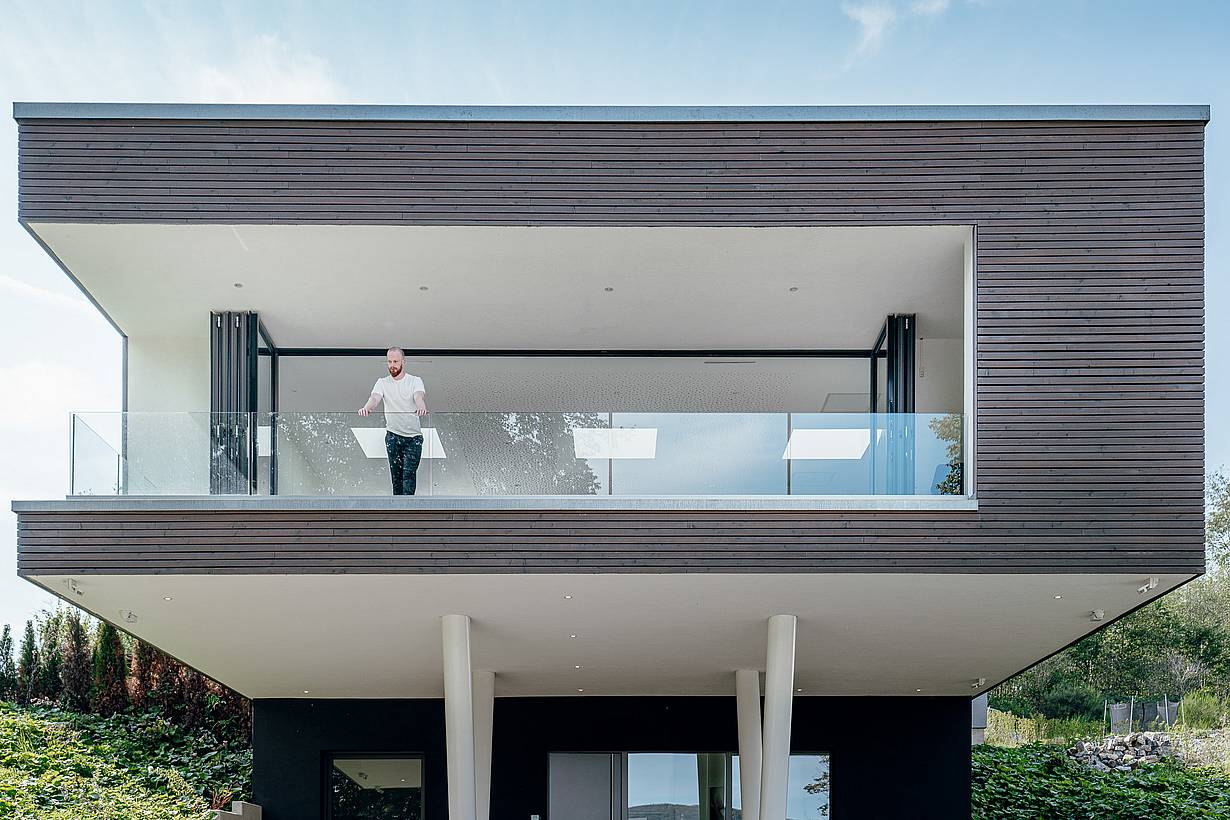 contemporary home with retractable glass walls