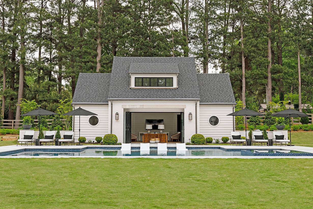 operable glass walls in pool house design