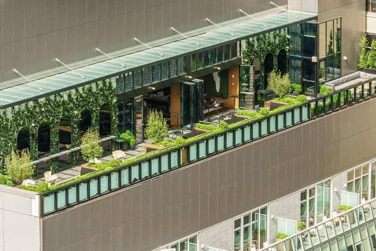 biophilic rooftop design with opening glass walls