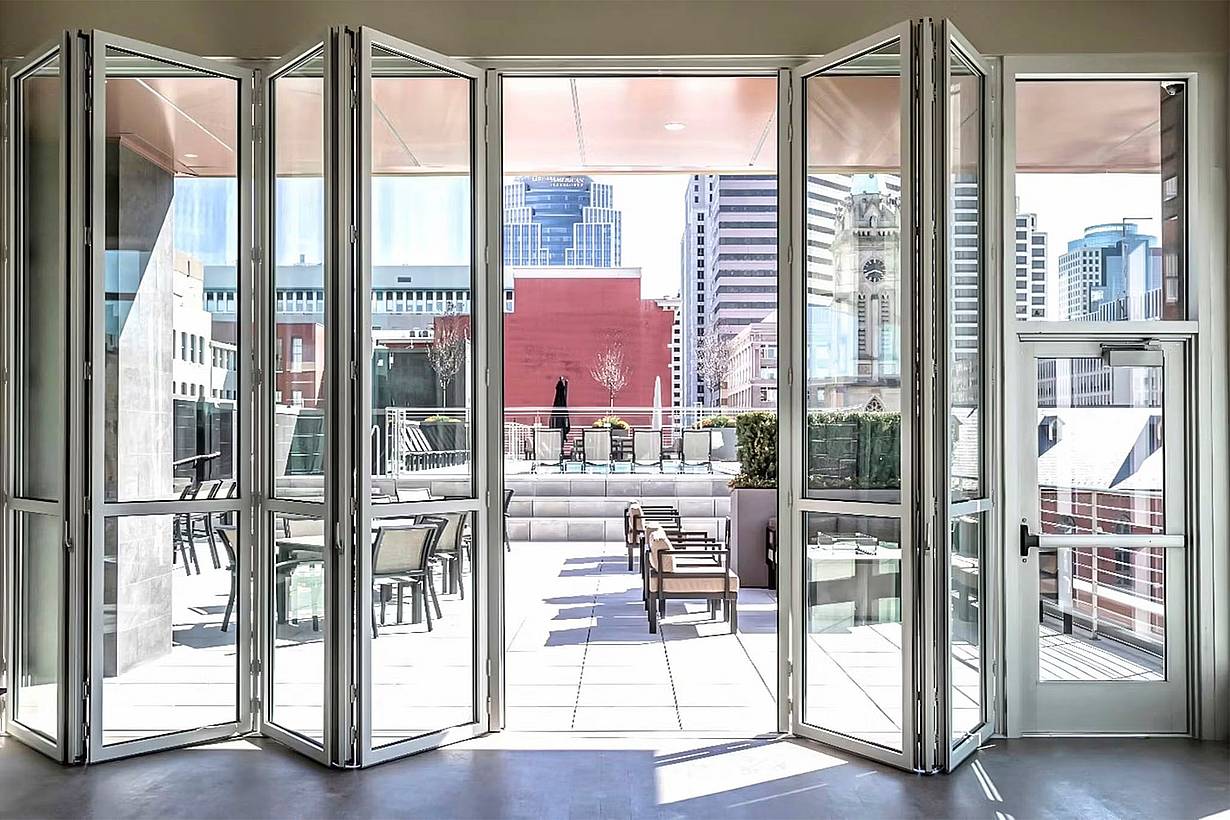folding and sliding glass walls for high windloads