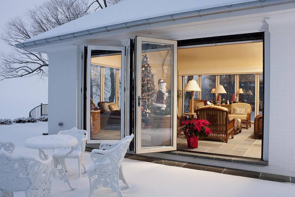 4-season room with retractable glass doors