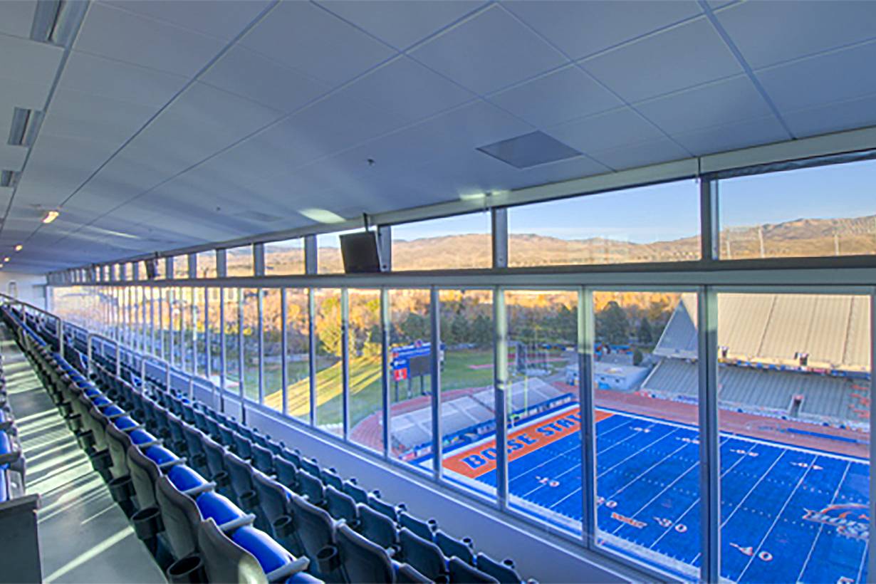 stadium design with stacking glass doors by NanaWall