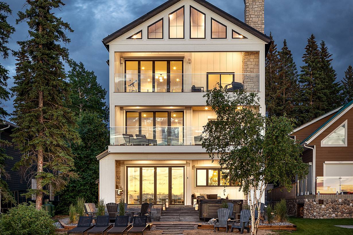 lakefront home design with NanaWall glass walls