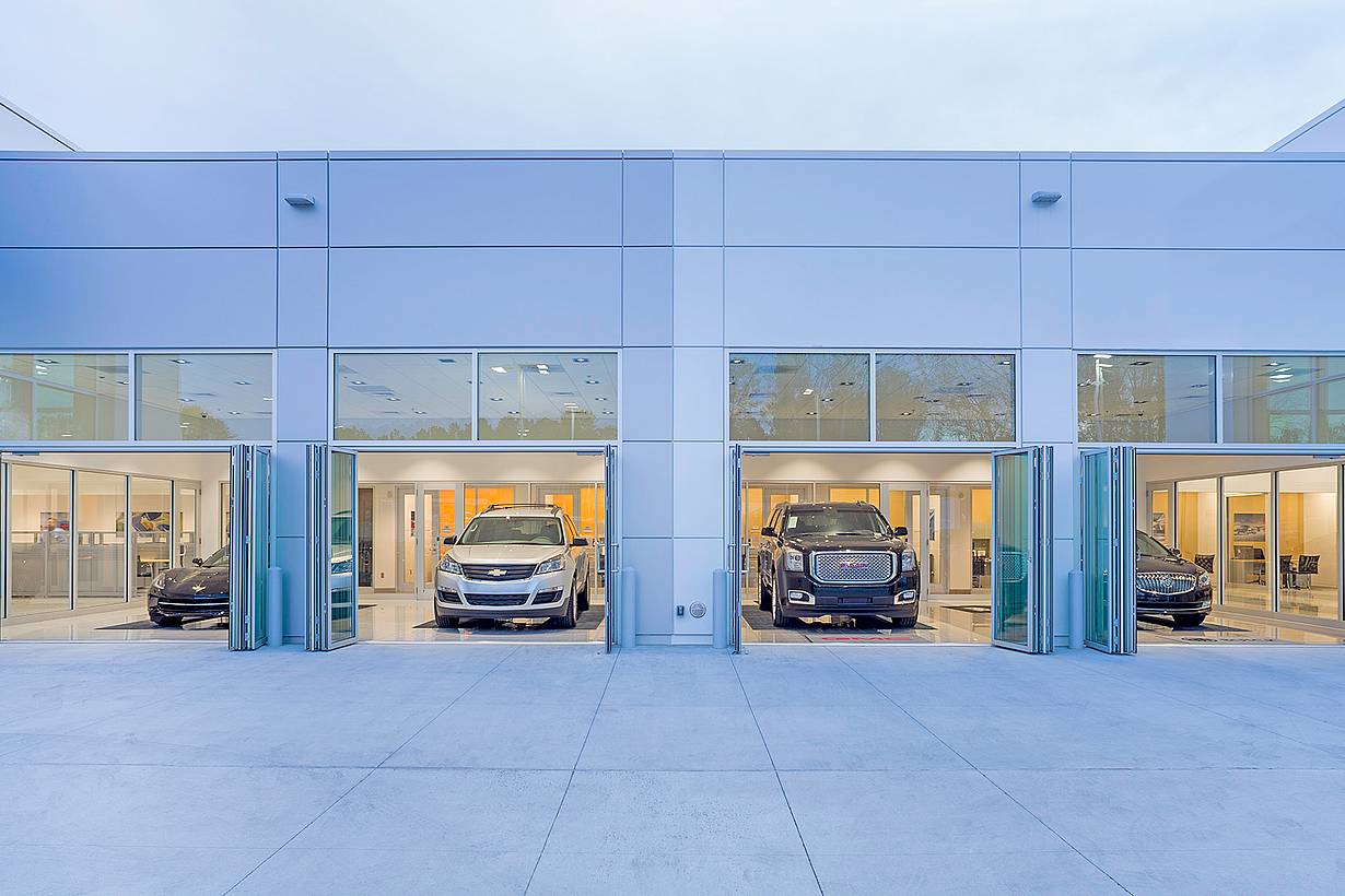 commercial glass doors in auto dealership design