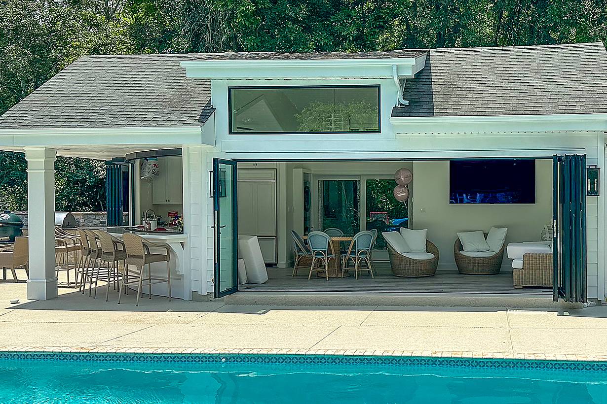 pool house designe with folding and sliding opening glass doors