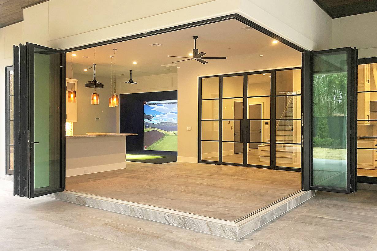 Custom home with residential folding glass door systems