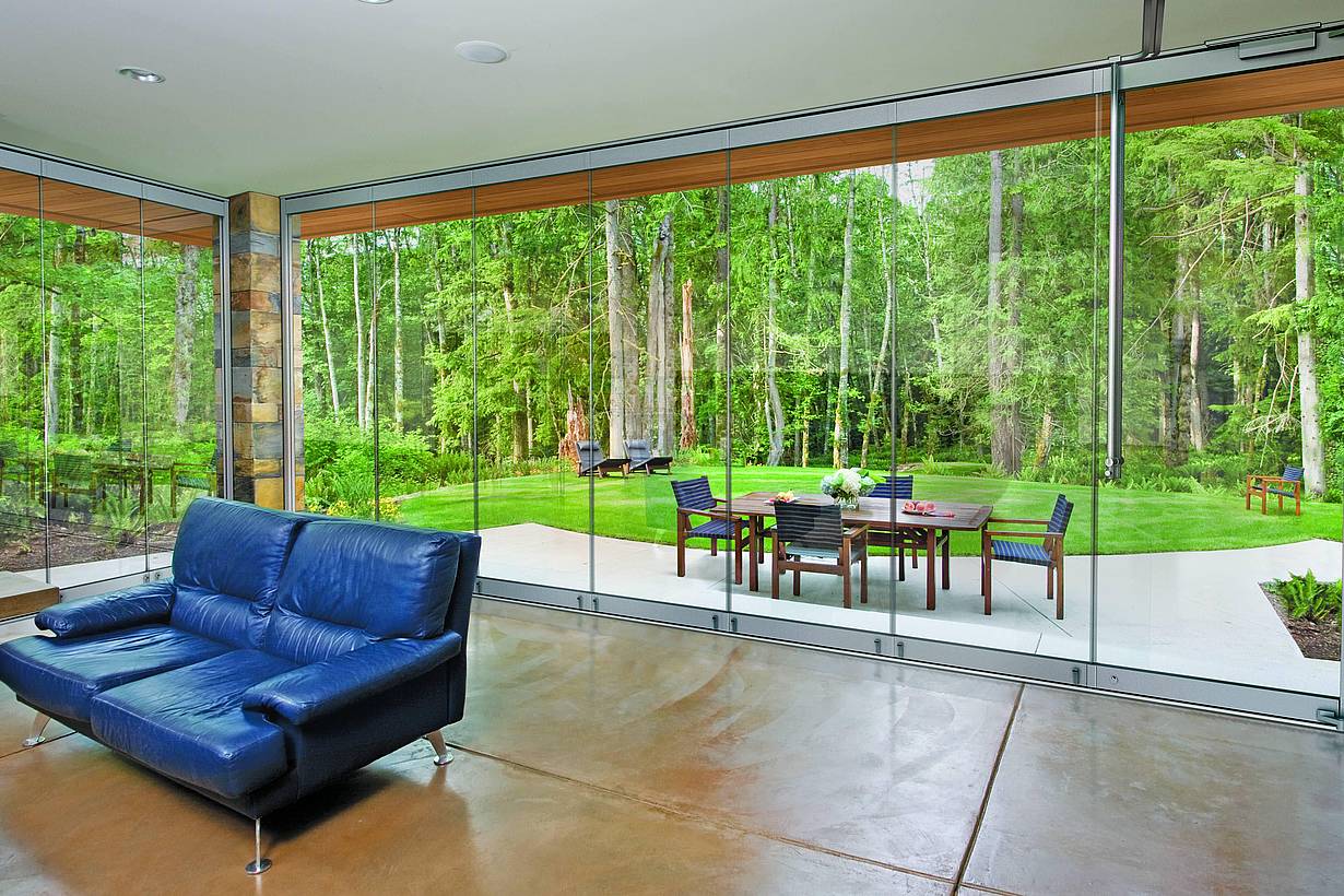frameless-glass-walls-with-nature-views and biophilic design principles