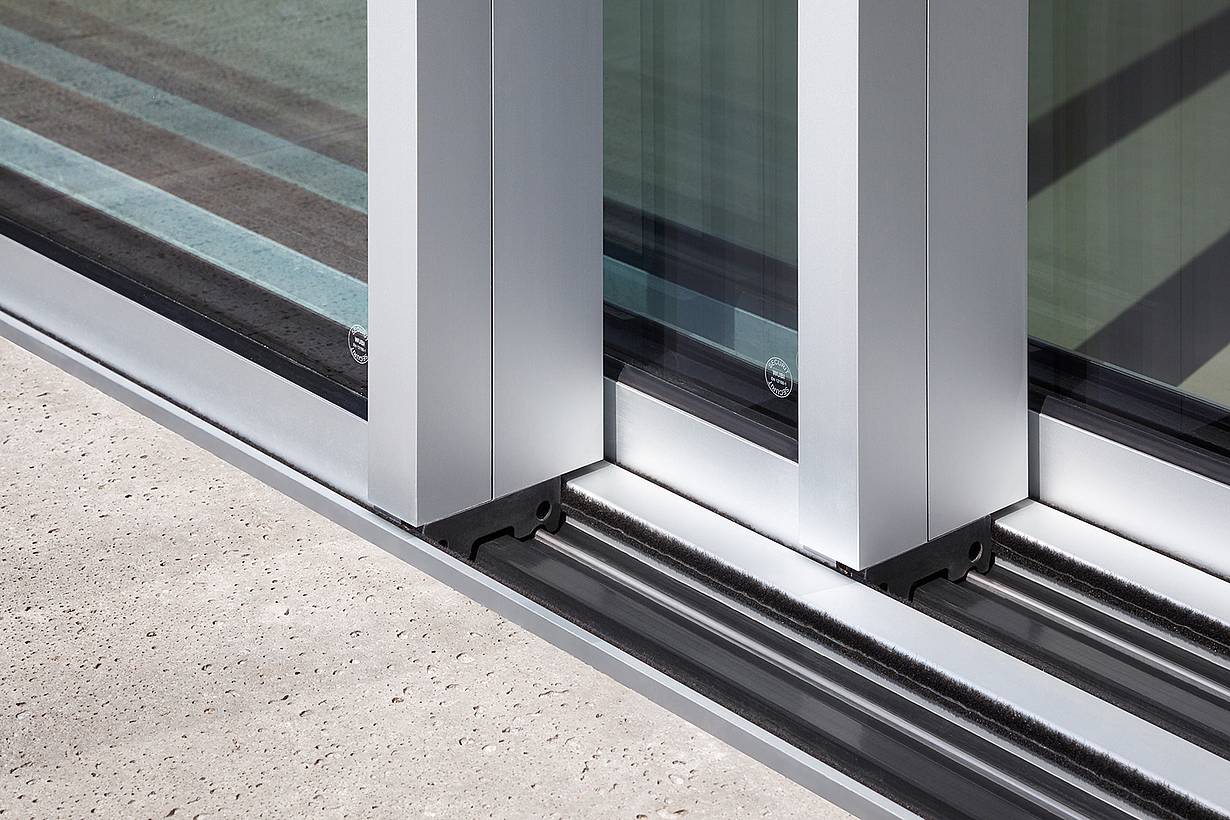 Close-up of the cero minimal sliding glass wall floor track