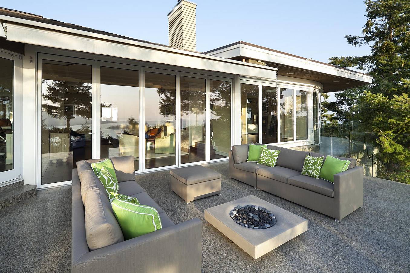 sliding patio doors open to parking bay area in Pacific Northwest residence, enhancing indoor-outdoor living
