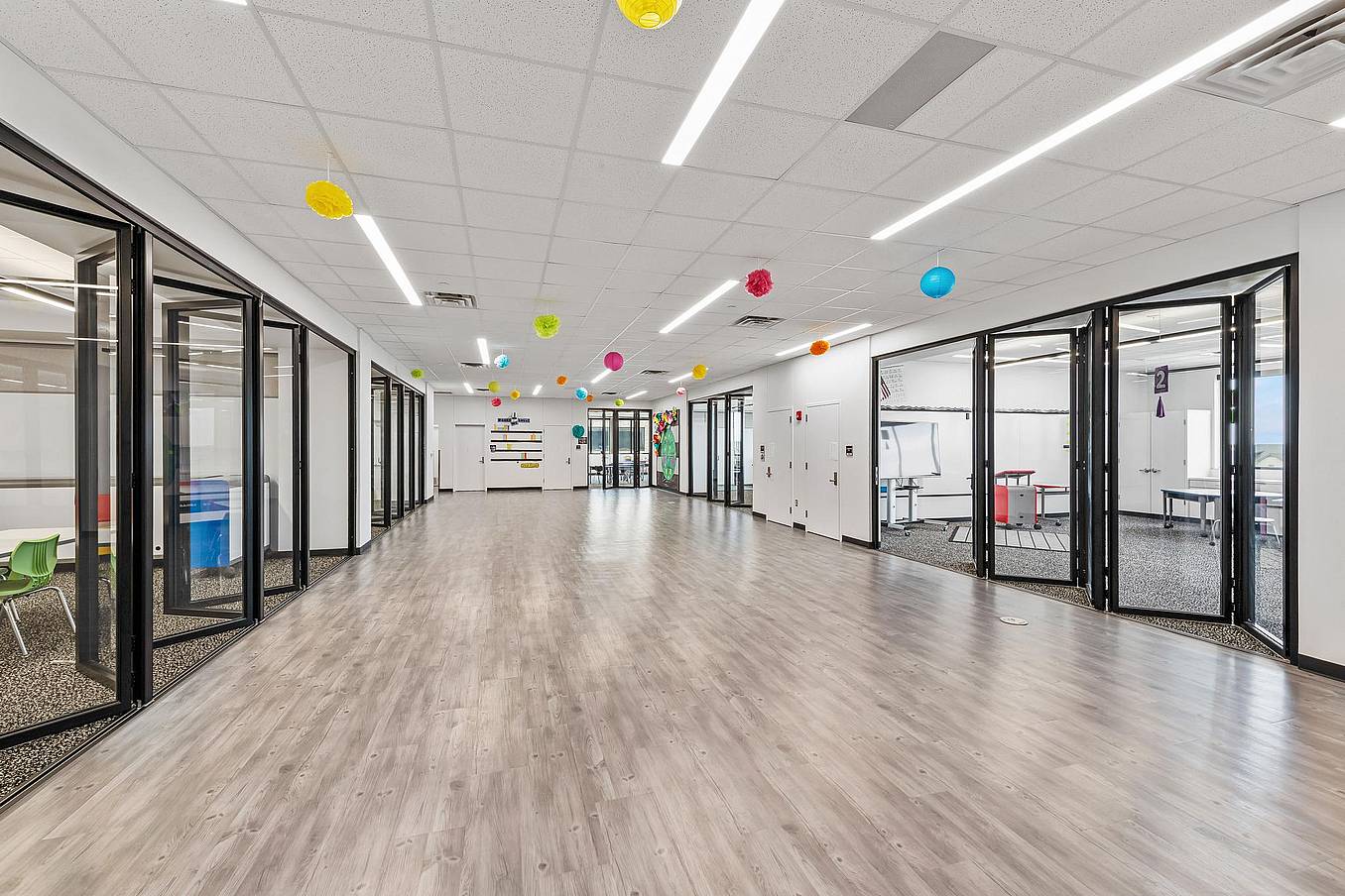 Classroom hallway with folding glass doors 