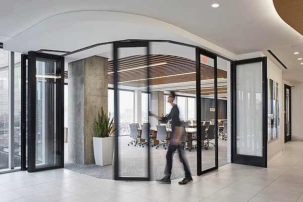 NanaWall HSW stacking glass doors, panels stacking into parking bay to create flexible space