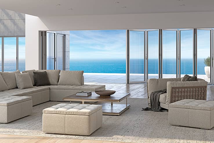 Modern  Living Room with Folding Glass Walls and a View of the Ocean