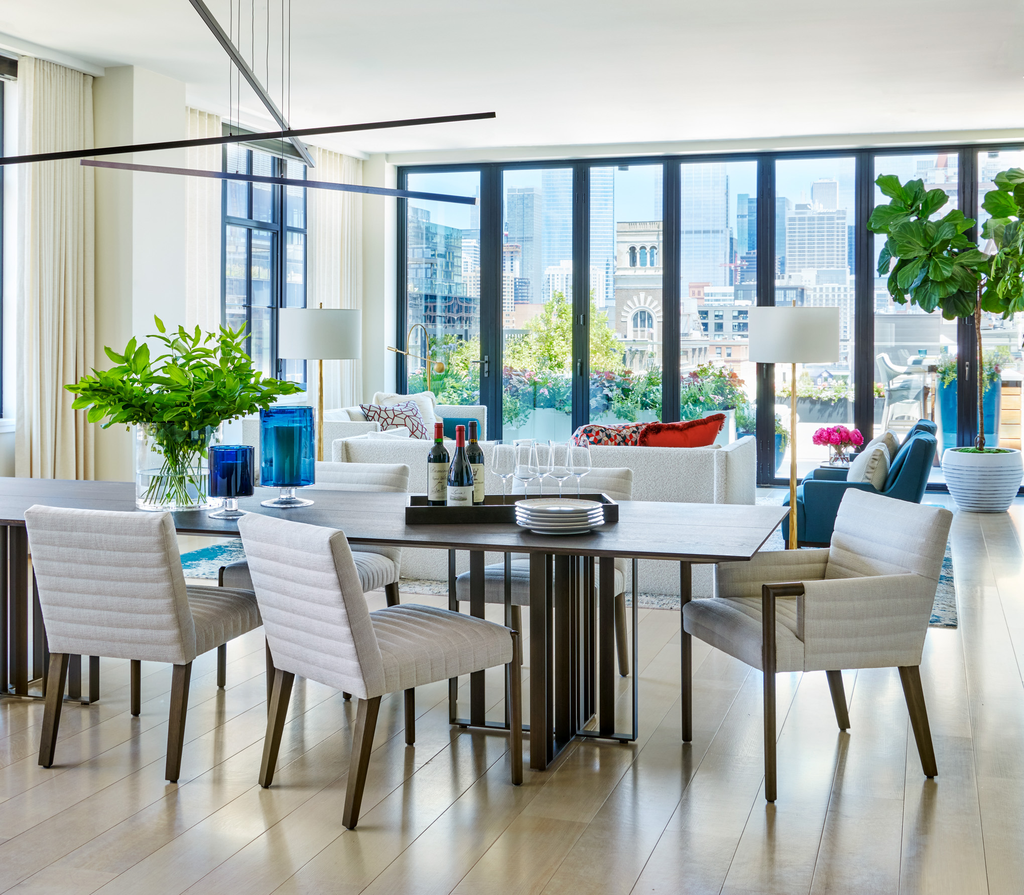 Luxury Penthouse Opens to Terrace with Accordion Glass Walls